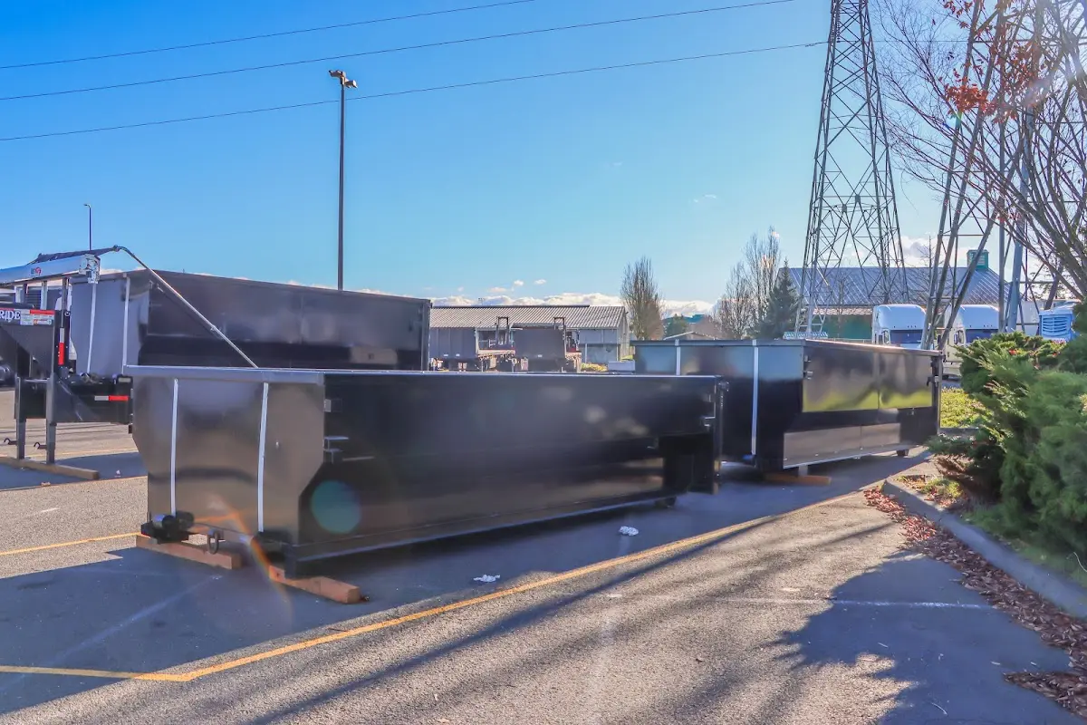 Roll-off dumpster ready for waste disposal at job site for 12 Yard Dumpster Rental in Summit